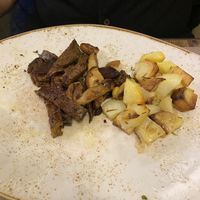 Seitan with mushrooms and potatoes  at Rifugio Romano in Rome