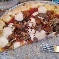 Ate half the pizza before I remembered to take a photo - so delicious. at Rifugio Romano in Rome