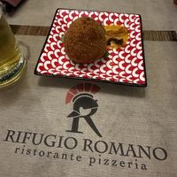 Arancino con pancetta  at Rifugio Romano in Rome