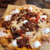 Pizza with seitan at Rifugio Romano in Rome