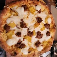 Oriental pizza with beyond saussages at Rifugio Romano in Rome