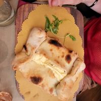 Pizza folded at Rifugio Romano in Rome