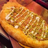 Pizza mortadella e crema di pistacchio  at Rifugio Romano in Rome