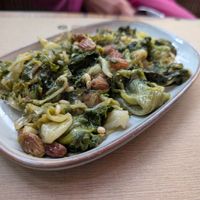 Stir fried greens with raisins and nuts at Rifugio Romano in Rome