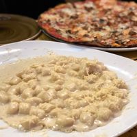 Four cheese gnocchi and pizza at Rifugio Romano in Rome