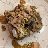 Lasagna with pistachio and artichoke, homemade jerusalem artichoke bechamel sauce and chips at Rifugio Romano in Rome