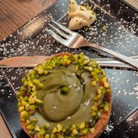 Pistachio and raspberry tartlet at Rifugio Romano in Rome