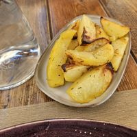 Potatoes side dish at Rifugio Romano in Rome