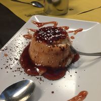 Vegan panda cotta with stawberry sauce at Rifugio Romano in Rome