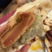 Vegan bacon was inside of calzone  at Rifugio Romano in Rome