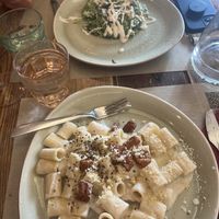 Spinach risotto and short pasta with cream cheese,Parmesan, vegan bacon and pepper corns 😋  at Rifugio Romano in Rome
