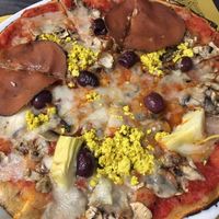 Best typical Italian nd vegan pizza I've ever had! at Rifugio Romano in Rome