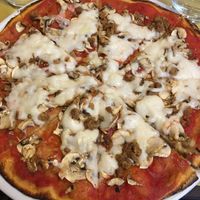 Sooo good, Pizza with crumbled Seiten and mushrooms  at Rifugio Romano in Rome