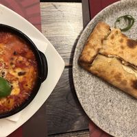 Vegan gnocchi (bottom), vegan calzone (top) at Rifugio Romano in Rome