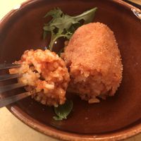 Rice balls with tomato sauce and cheese at Rifugio Romano in Rome