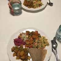 Potatoes, peas & curry; beet hummus; cous cous salad; tofu & rice; vegetable crepe. So delicious! at Herbivore in Prague