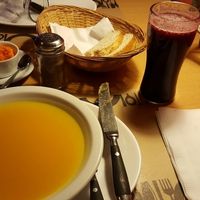 Soup starter and juice - and Carrott hummus  at Vegetariano in San Carlos De Bariloche