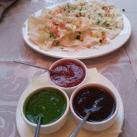 Papadums with vegetables and sauses at Indian Raja in Riga