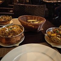 Chana masala, potato naan, mushroom rice and aloo gobi. All delicious. at Indian Raja in Riga