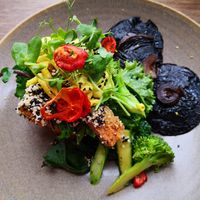 Portobello vegan benedict —
agria rosti, crispy sesame tofu,
mushroom, winter greens &
hazelnut hollandaise at Bespoke Kitchen  in Queenstown