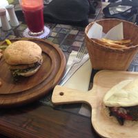 mixed mushroom burger, Thai falafel wrap with hand cut fries and a fresh juice at Karma Kitchen in Chiang Mai