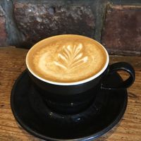 Flat white with oat milk  at Riverhill Coffee Bar in Glasgow
