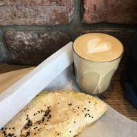 Squash korma pastie and an oat milk latte at Riverhill Coffee Bar in Glasgow
