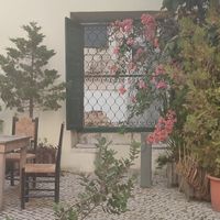 Sitting at the window... from the inner garden! at Agua no Bico in Lisbon