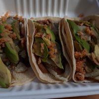 Tacos with potato, beans, rice and avocado. Special order at Los Amigos Burritos Taqueria  in Florence