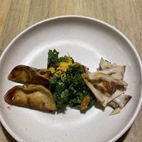 Wontons, kale, and mushrooms   at Ali Pacha in La Paz