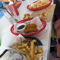 Spicy burger, nuggets for kiddo, and a spicy dog #Veganuary at Comet 984 in Playa Del Carmen