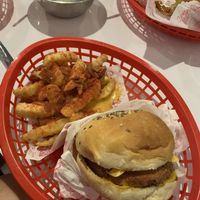 Cheese burger with Beyond patty and cheese fries at Comet 984 in Playa Del Carmen