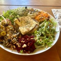 Salad Plate with Baru Nut Burgerr  at Cravo e Canela in Alto Paraiso