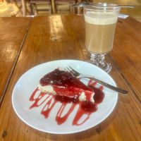 Cheesecake with Fruit Sauce &  Cappuccino   at Cravo e Canela in Alto Paraiso