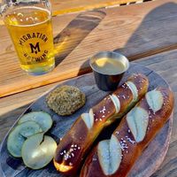Vegan queso and no-butter pretzel  at Migration Brewing in Portland