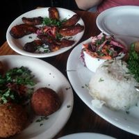 Communista plate, fried plantains, and fritters at Pambiche in Portland