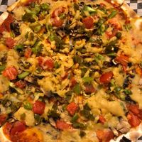 The vegan "vege pizza" sub olives for jalapeños  at Dirty Pizza in Montreal