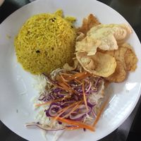 yellow rice with crackers and nice salad  at Vege Pot 素砂煲 in Central Singapore