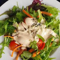 SESAME, Mixed salad, cherry tomatoes, carrots and sesame dressing at Vitto Pitagorico in Naples