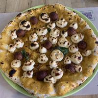 Pumpkin pizza with falafel balls and vegan ricotta  at Vitto Pitagorico in Naples