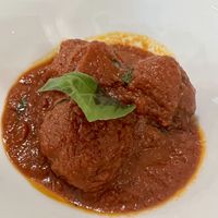 Classic Neapolitan meatballs, crispy on the outside, soft on inside and swimming in thick tomato sauce   at Vitto Pitagorico in Naples
