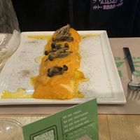 Ravioli ripieni di ricotta di mandorle con crema di zucca e funghi  at Vitto Pitagorico in Naples