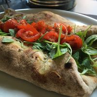 Stuffed pizza with eggplant- the Theorema  at Vitto Pitagorico in Naples