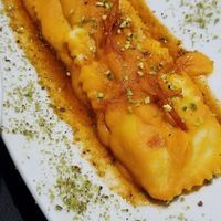 Ravioli! The sauce was squash blended with orange and had candied chili orange rind on top. Superb! at Vitto Pitagorico in Naples