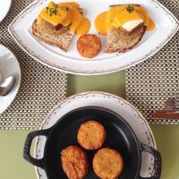 Eggs Benedict with side of potatoes  at Wynn Hotel - Tableau in Las Vegas