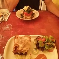 Lasagna y pimientos rellenos 🤤 at Estudio Vegetariano in Lagos