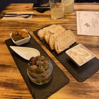 Bites (toast with garlic mayo, carrot, and olives) at Estudio Vegetariano in Lagos