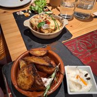 Lasagne and rosemary potatoes at Estudio Vegetariano in Lagos