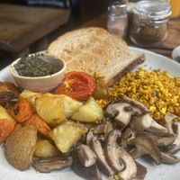 The vegan breakfast, pesto, toast, tofu scramble, dry mushrooms lol, tomato and roasted veggies   at Coconut Monkey in Koh Tao