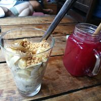 Overnight oats with banana topping. Raw juice. at Coconut Monkey in Koh Tao
